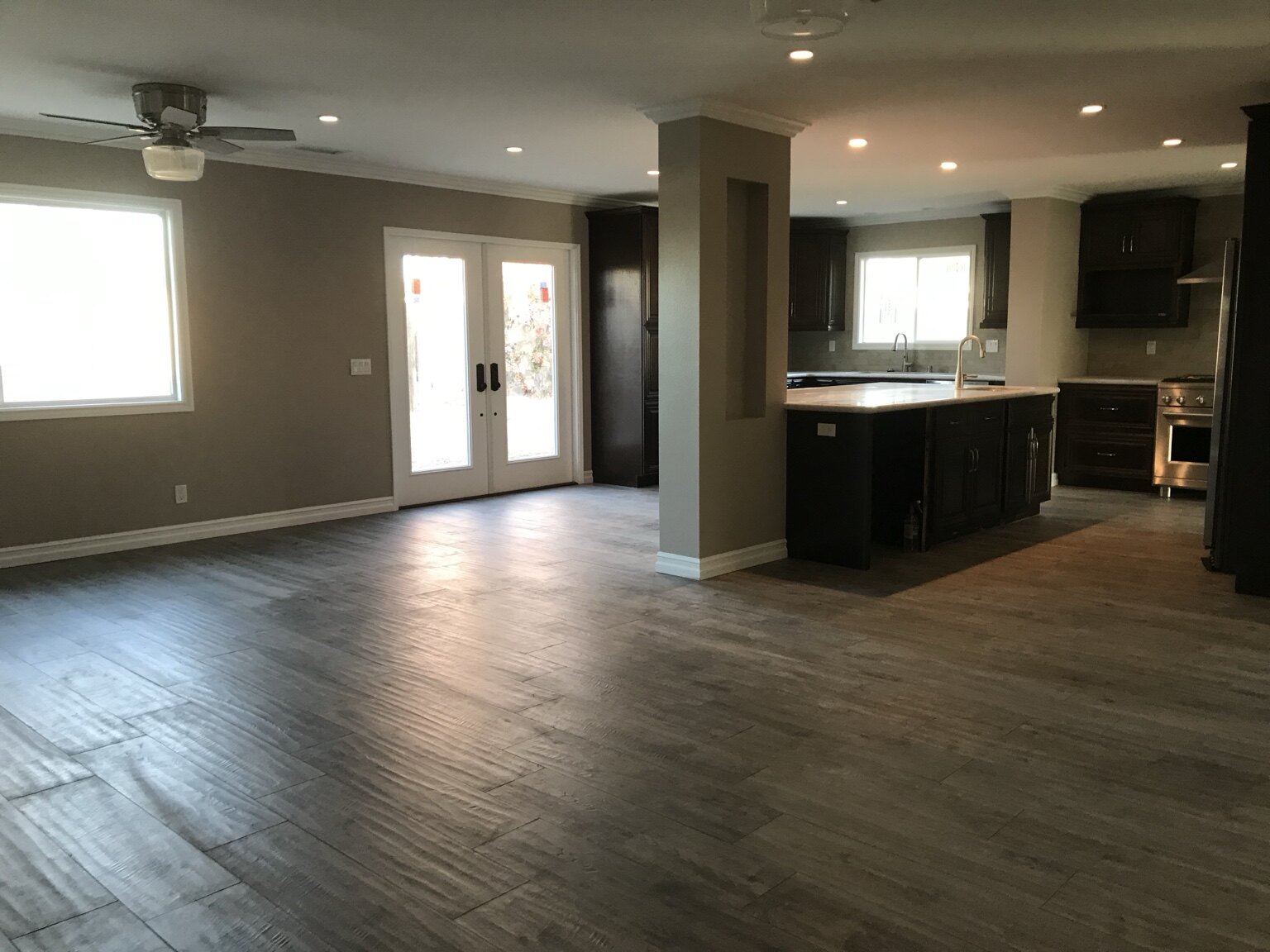 Completed open living area and kitchen in a major home addition