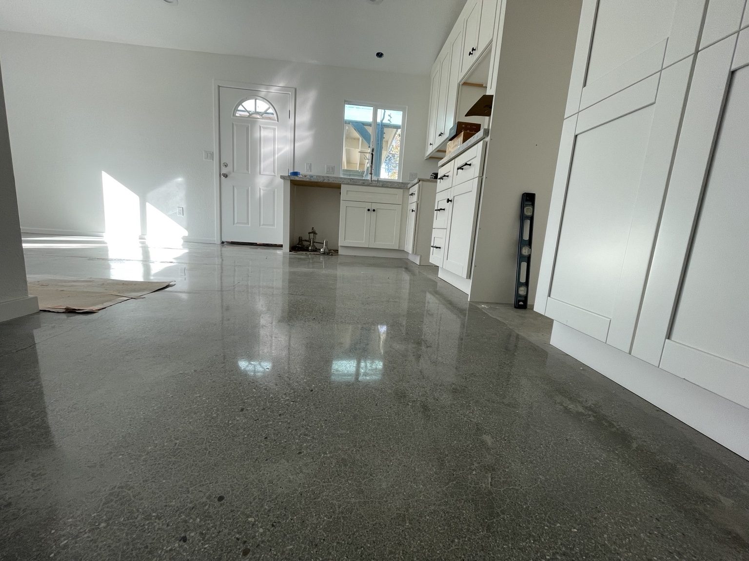 Completed Carpinteria ADU with white birch kitchen and polished concrete floors