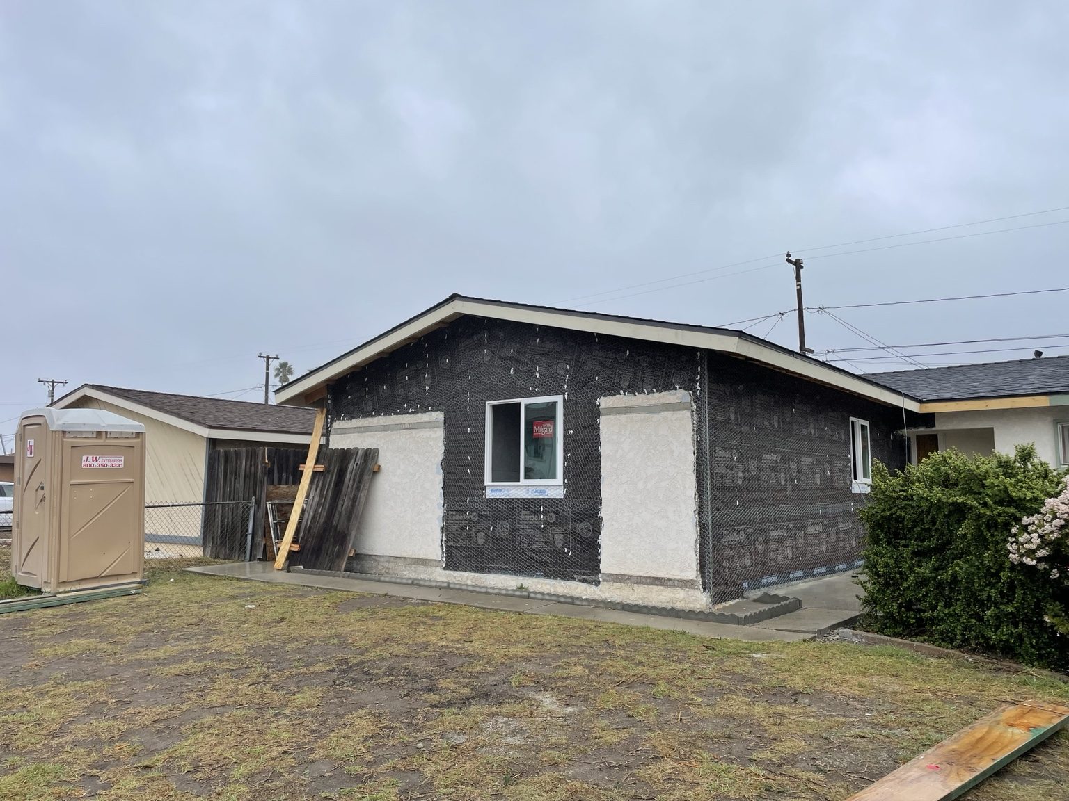Stucco lath and new windows on the ADU exterior